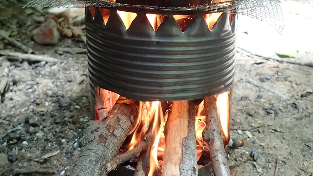 A fuel port and vents are critical for airflow and wood to burn. 