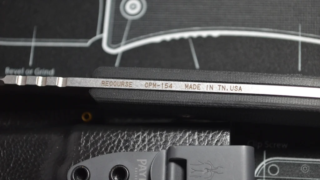 The spine also bears the name of the knife, the steel, and a notification that this knife was made in the USA.