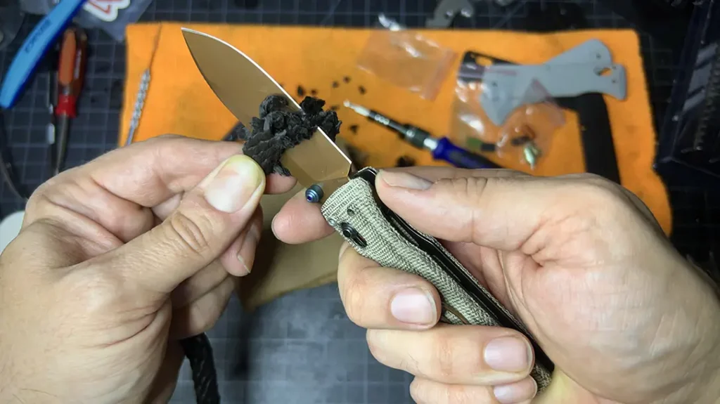 The M390 blade stock measures .118 thousandths of an inch, plenty thick for a sub-three-inch design.