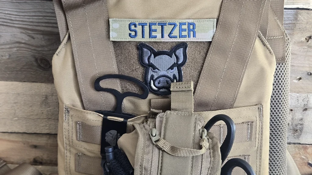 If you wear an outer vest carrier for your armor, attaching the ASP PDK Push Knife there is another good option.