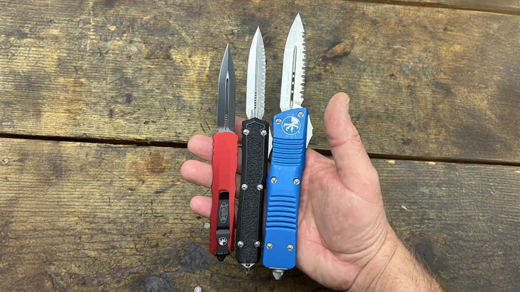 Sense of scale of the various auto folders by being placed in the hand. Left to right are the Dirac, Makora, and Combat Troodon.