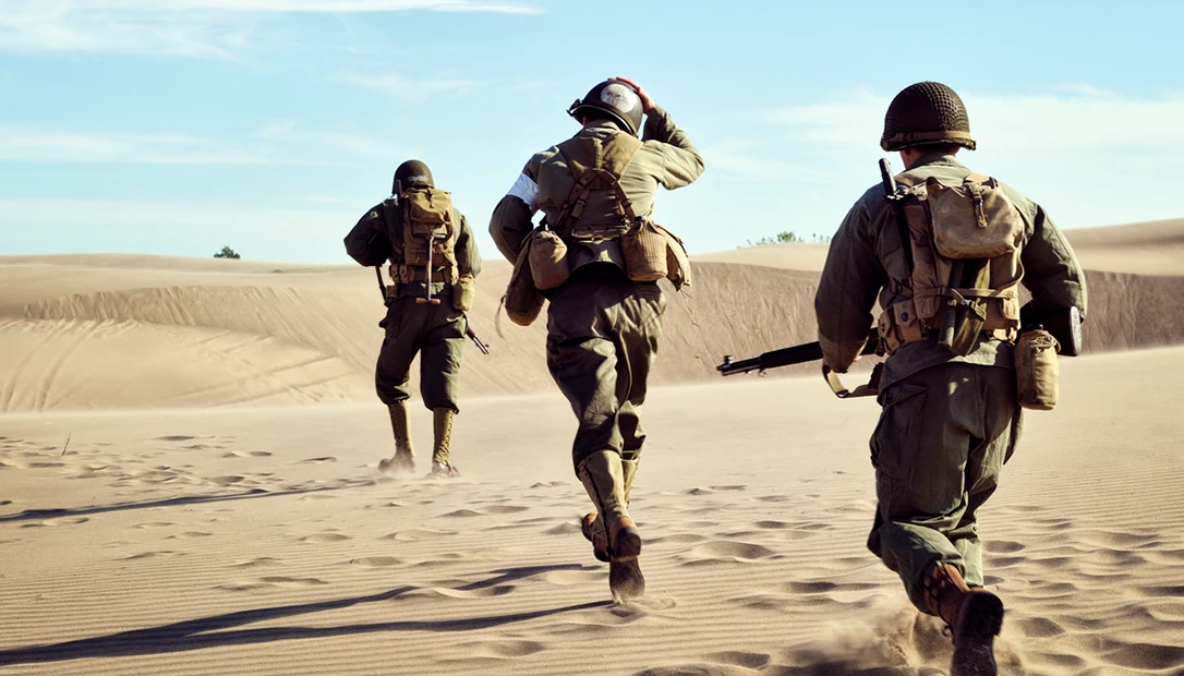 U.S. Army Special Forces candidates navigating rugged terrain during selection training